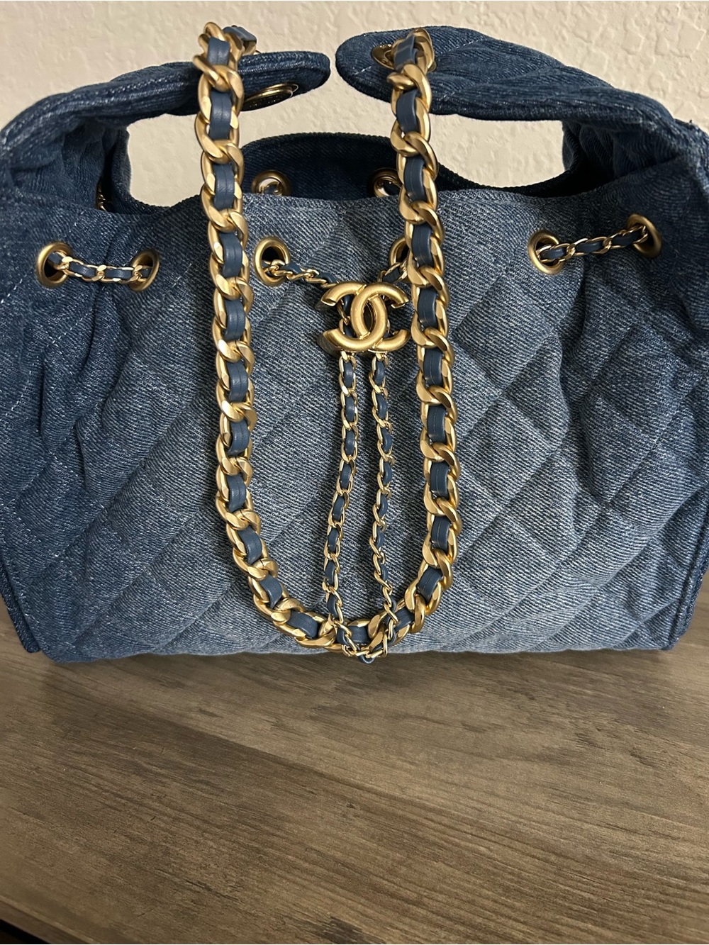 CHANEL Quilted Denim Drawstring Tote with Gold Chain